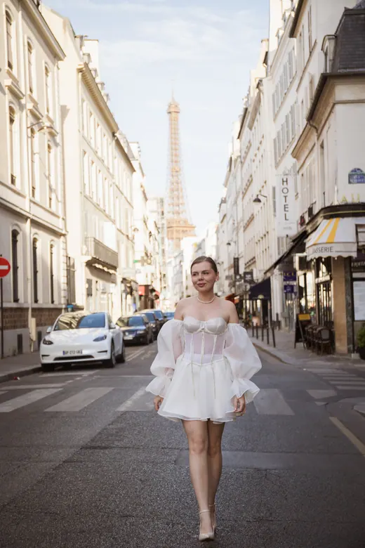 Photograph from the Couple — white dress, street session in Paris by Anna
