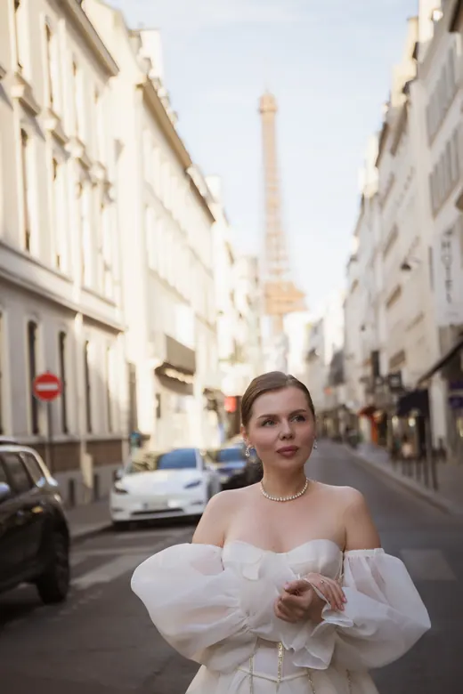 Photograph from the Couple — white dress, street session in Paris by Anna