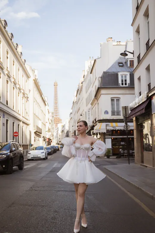 Photograph from the Couple — white dress, street session in Paris by Anna