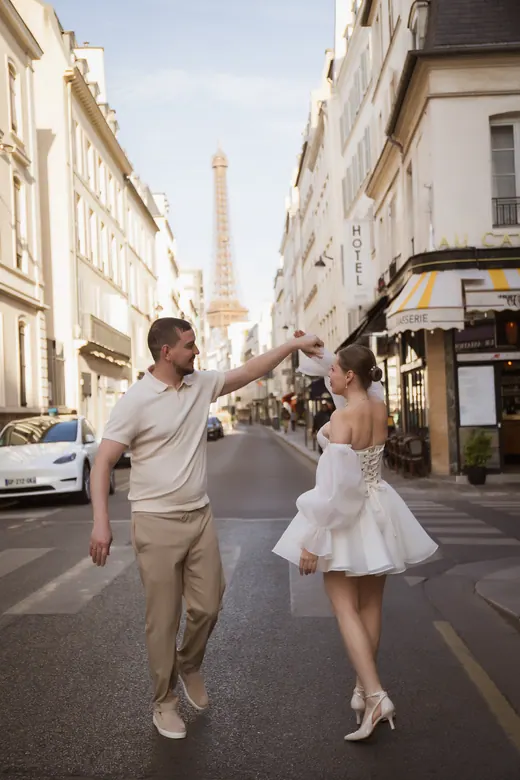 Photograph from the Couple — white dress, street session in Paris by Anna