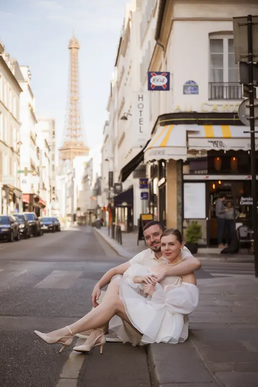 Photograph from the Couple — white dress, street session in Paris by Anna