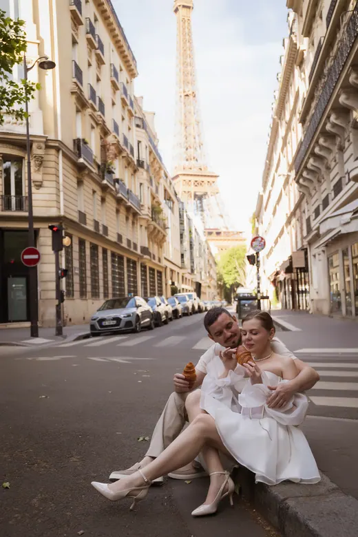 Photograph from the Couple — white dress, street session in Paris by Anna