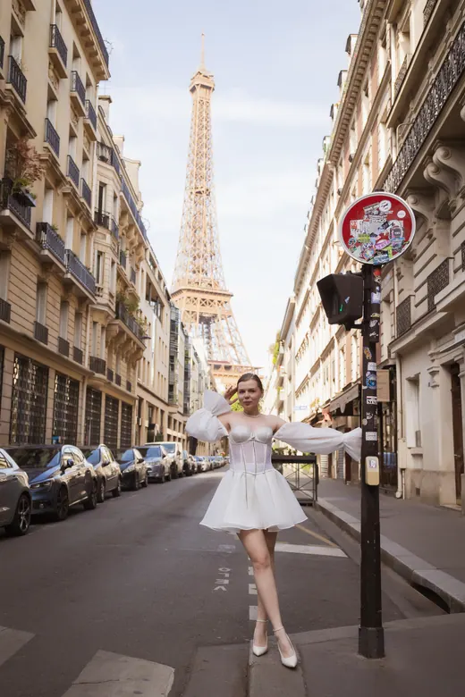 Photograph from the Couple — white dress, street session in Paris by Anna