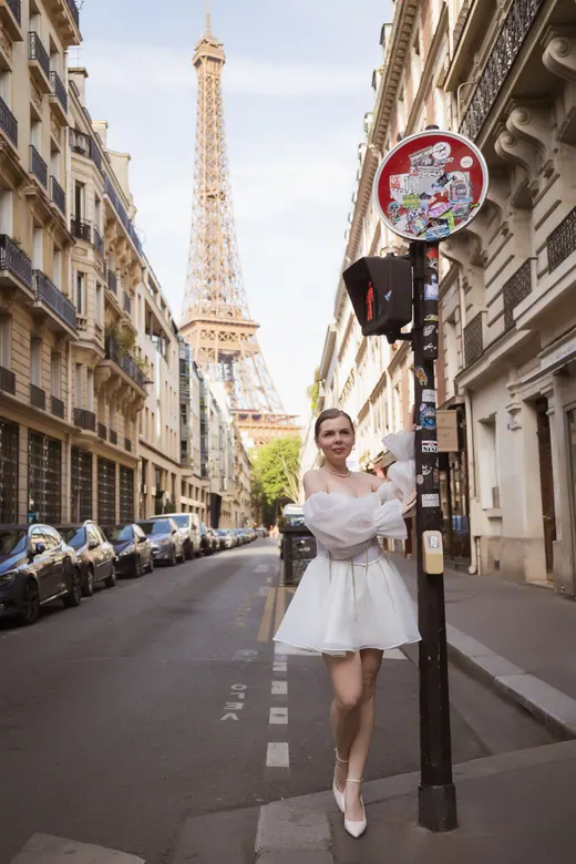 Photograph from the Couple — white dress, street session in Paris by Anna