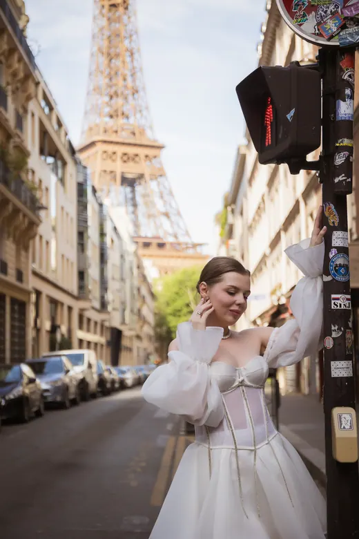 Photograph from the Couple — white dress, street session in Paris by Anna
