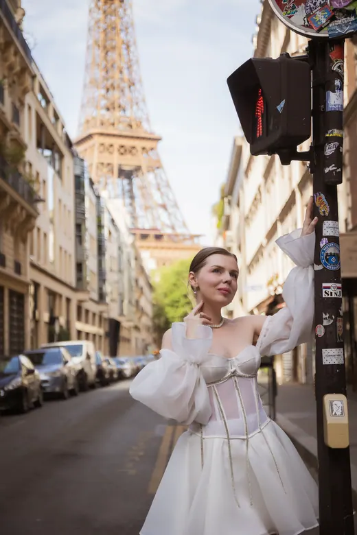 Photograph from the Couple — white dress, street session in Paris by Anna
