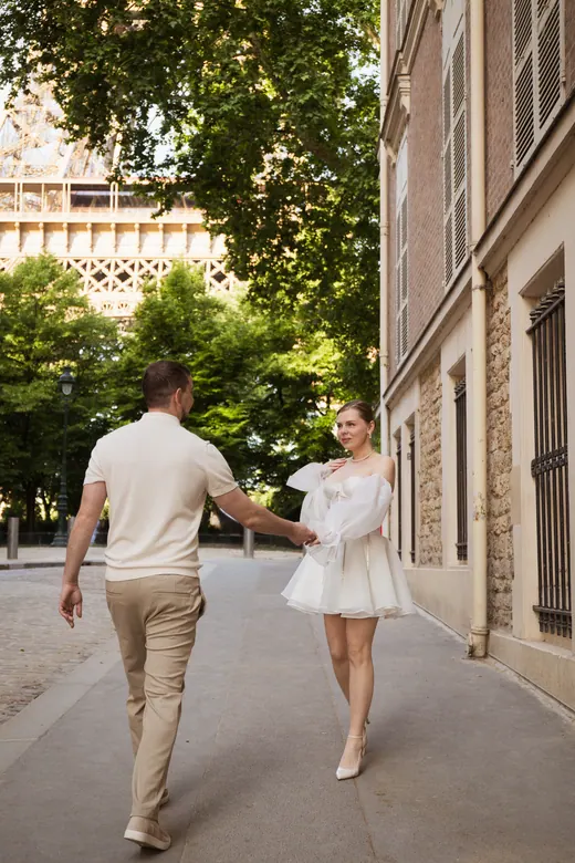 Photograph from the Couple — white dress, street session in Paris by Anna