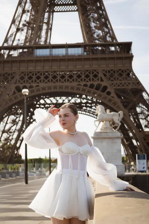 Photograph from the Couple — white dress, street session in Paris by Anna