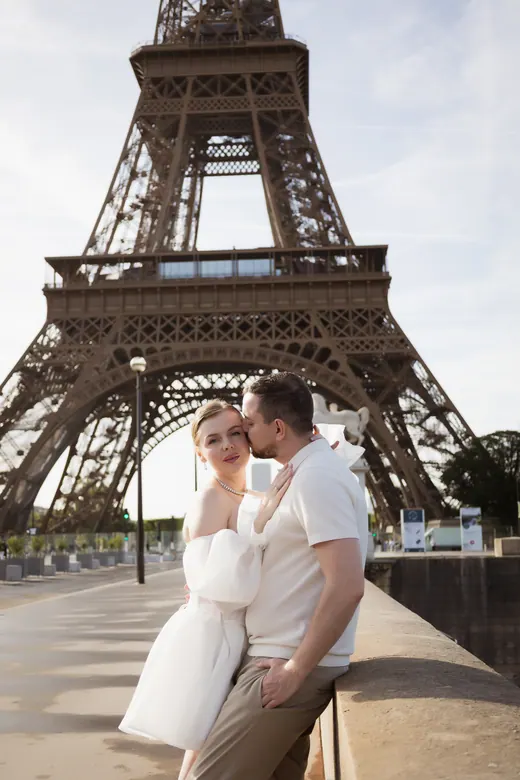 Photograph from the Couple — white dress, street session in Paris by Anna