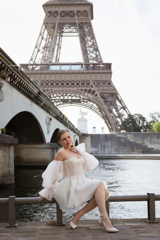 Photograph from the Couple — white dress, street session in Paris by Anna