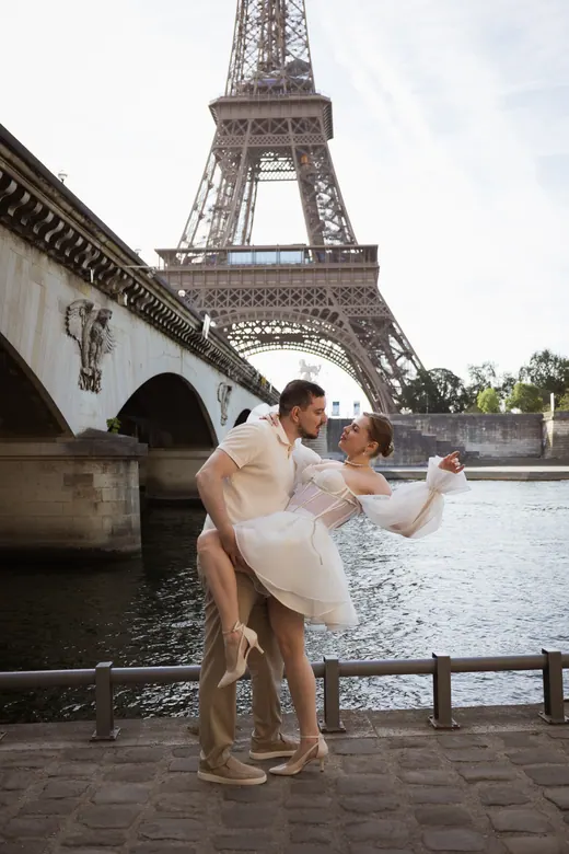 Photograph from the Couple — white dress, street session in Paris by Anna