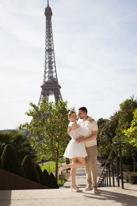 Photograph from the Couple — white dress, street session in Paris by Anna