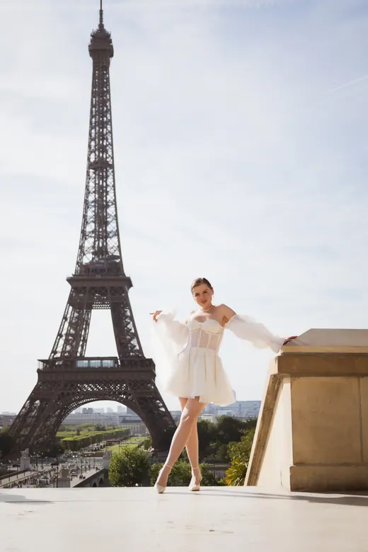 Photograph from the Couple — white dress, street session in Paris by Anna