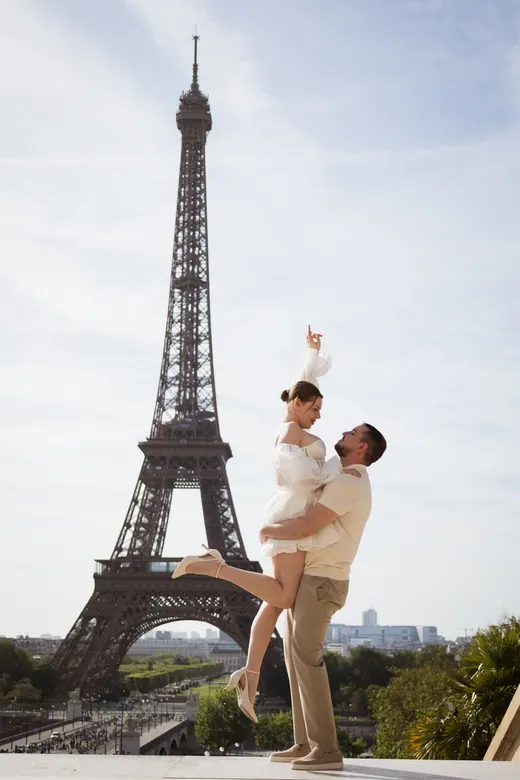 Photograph from the Couple — white dress, street session in Paris by Anna
