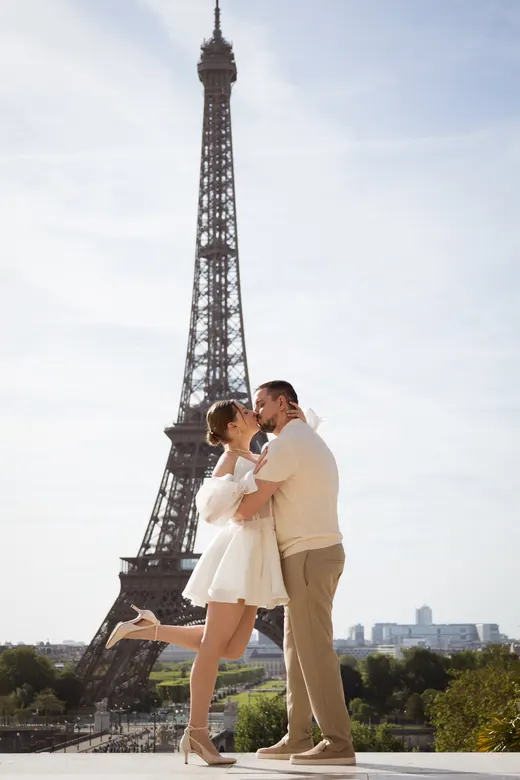 Photograph from the Couple — white dress, street session in Paris by Anna