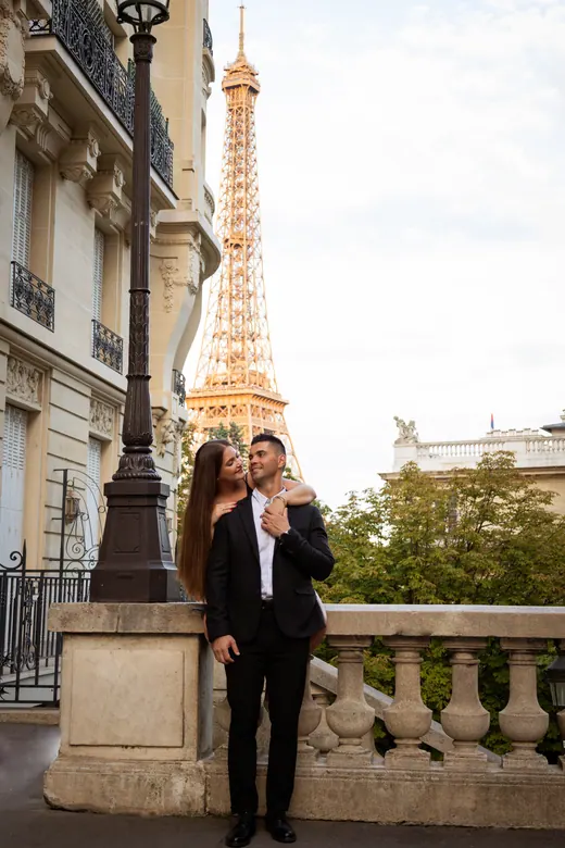 Photograph from the Couple — red dress at night session in Paris by Anna