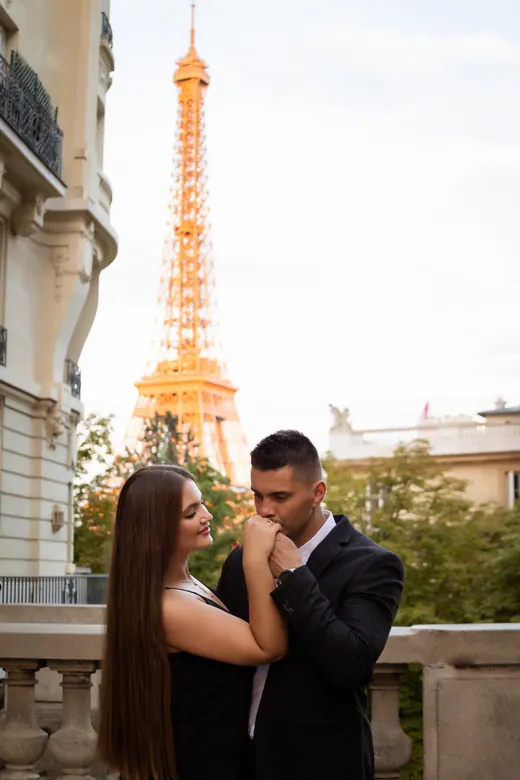 Photograph from the Couple — red dress at night session in Paris by Anna