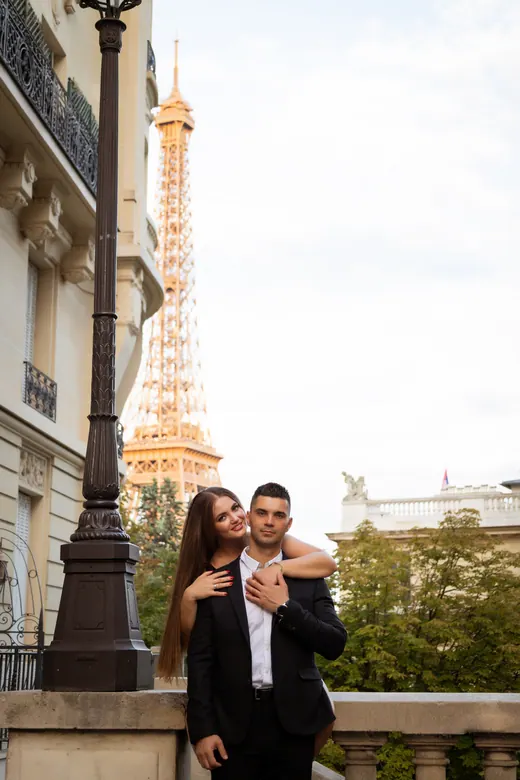 Photograph from the Couple — red dress at night session in Paris by Anna