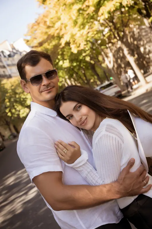 Photograph from the Couple — sunlit avenue session in Paris by Anna