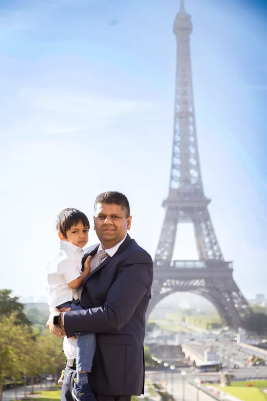 Photograph from the Family — red dress, Eiffel session in Paris by Anna