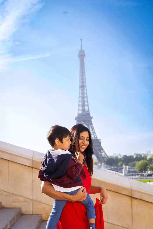 Photograph from the Family — red dress, Eiffel session in Paris by Anna