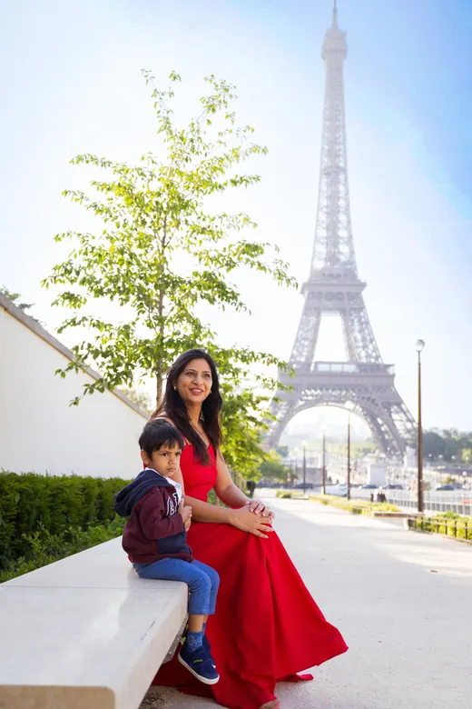 Photograph from the Family — red dress, Eiffel session in Paris by Anna
