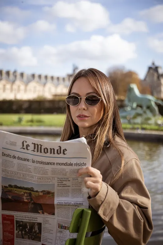Photograph from the Trench coat — newspaper session in Paris by Anna