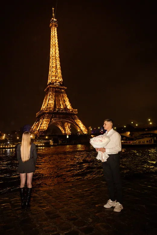 Photograph from the Proposal — white bouquet at night session in Paris by Anna