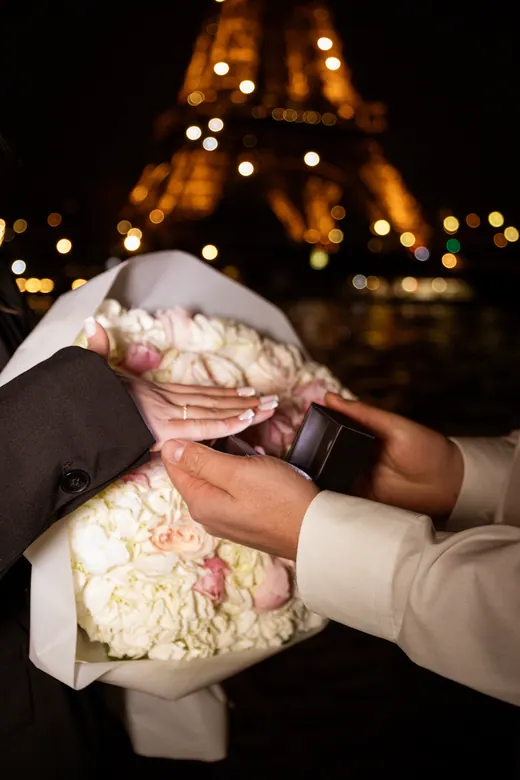 Photograph from the Proposal — white bouquet at night session in Paris by Anna