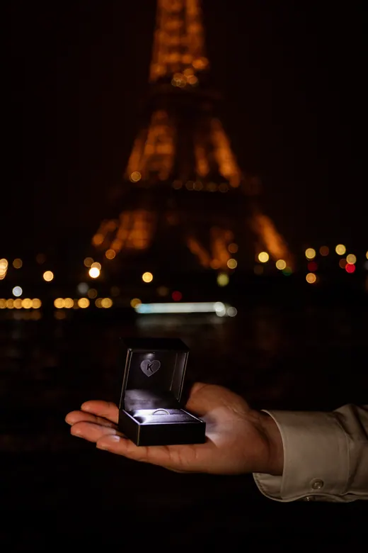 Photograph from the Proposal — white bouquet at night session in Paris by Anna