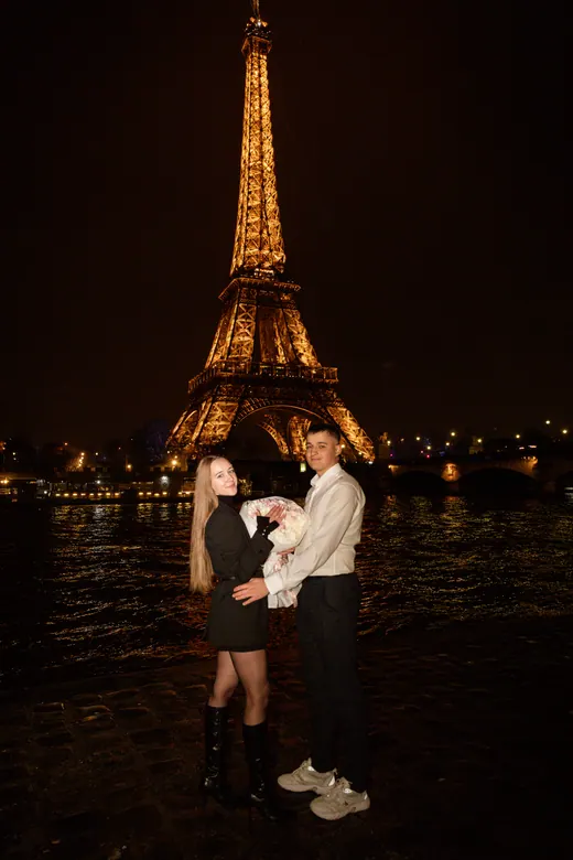 Photograph from the Proposal — white bouquet at night session in Paris by Anna